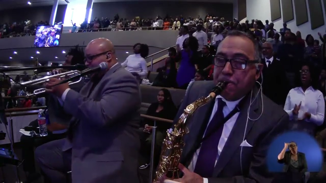 Dr. Marcus D. Cosby sings 