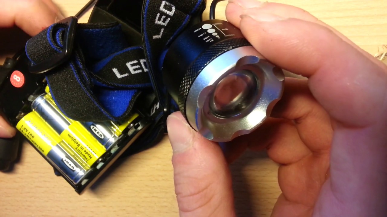 Dissasembly and repair - strong 20 000 Lumens treking zoom headlight from China - Result: SUCCESS