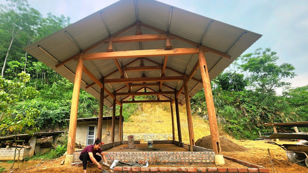 Designing and constructing a solid foundation for a wooden house.
