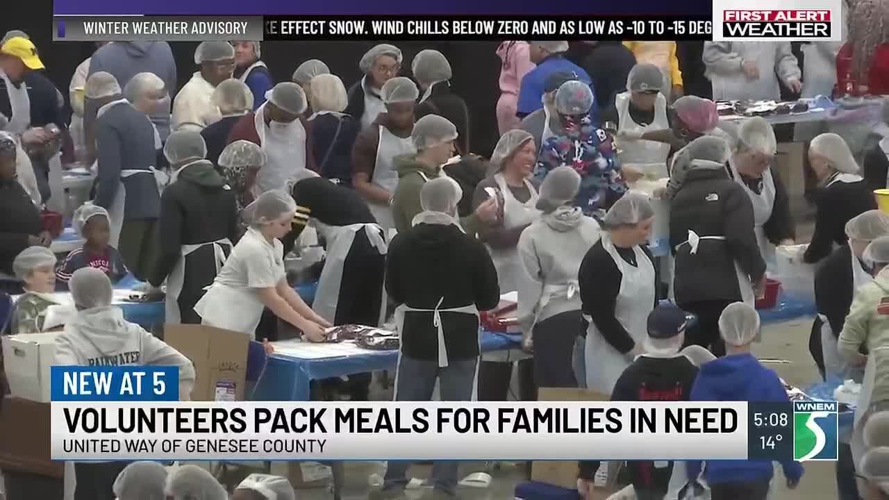 Volunteers pack meals for families in need, honoring Dr. King's legacy
