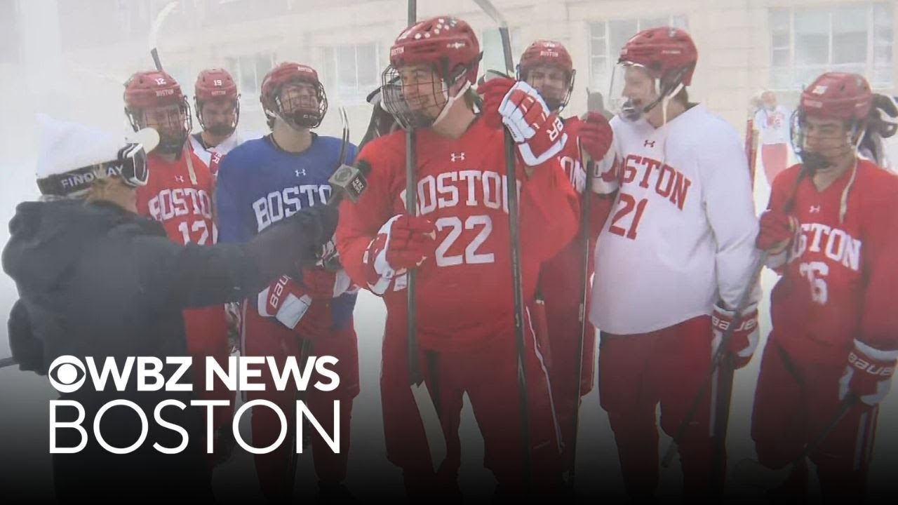 Boston University hockey players walk to practice during blizzard