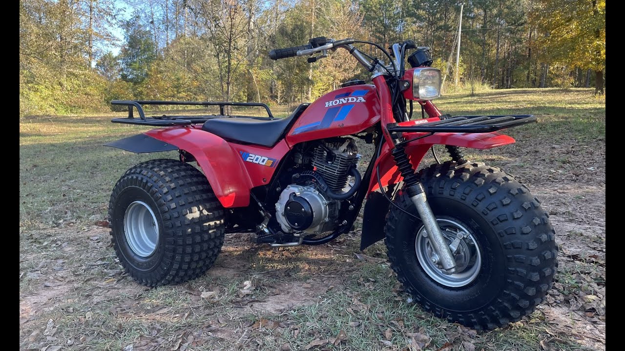 TEARING INTO THE ENGINE ON MY MINT HONDA ATC 200S 3 WHEELER