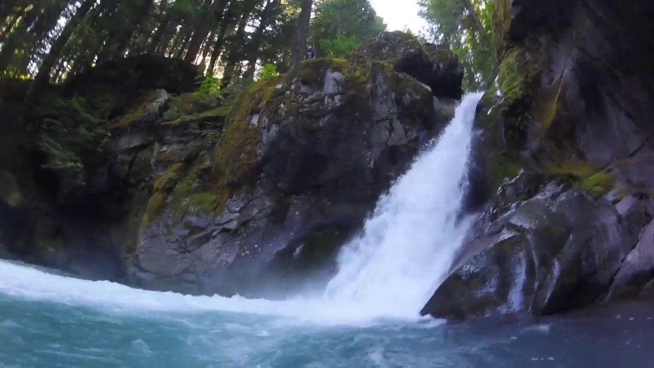 Cliff jumping at a secret waterfall in Washington