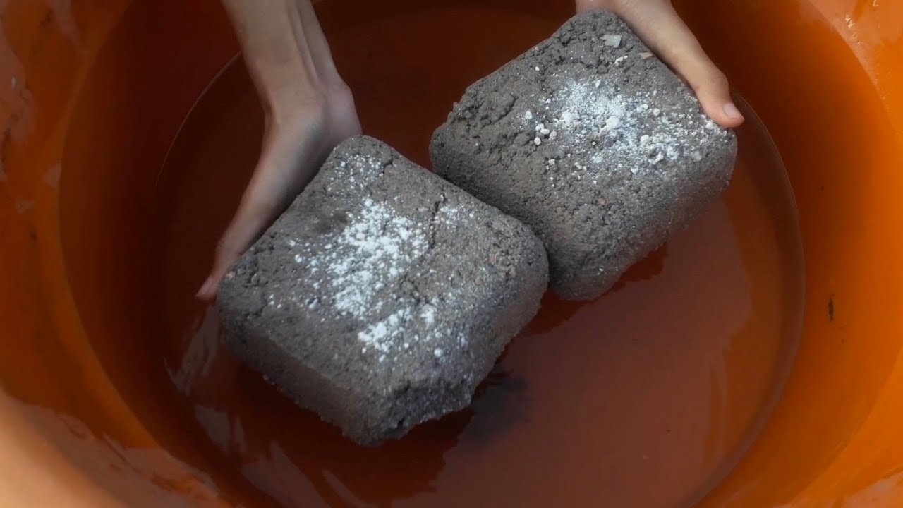 New white powder pouring on cement shapes crumbling in lot's of water ASMR video 💧😴💤💦