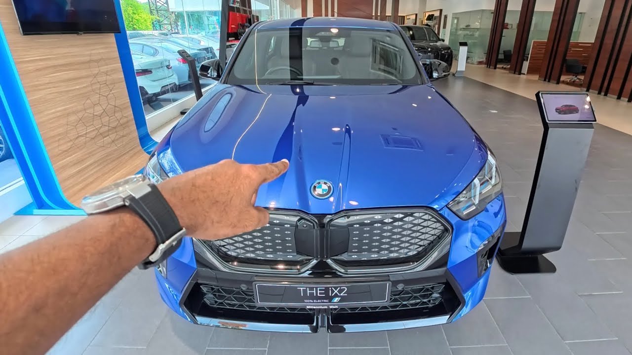 POV! BMW iX2 xDrive30 in Portimao Blue Metallic & Veganza Perforated | Mocha