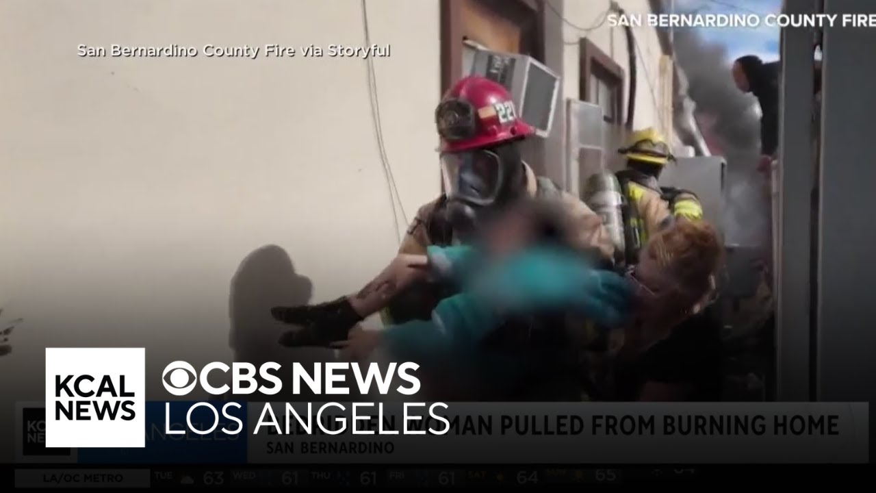 Dramatic video captures moment San Bernardino firefighters pull woman from burning home
