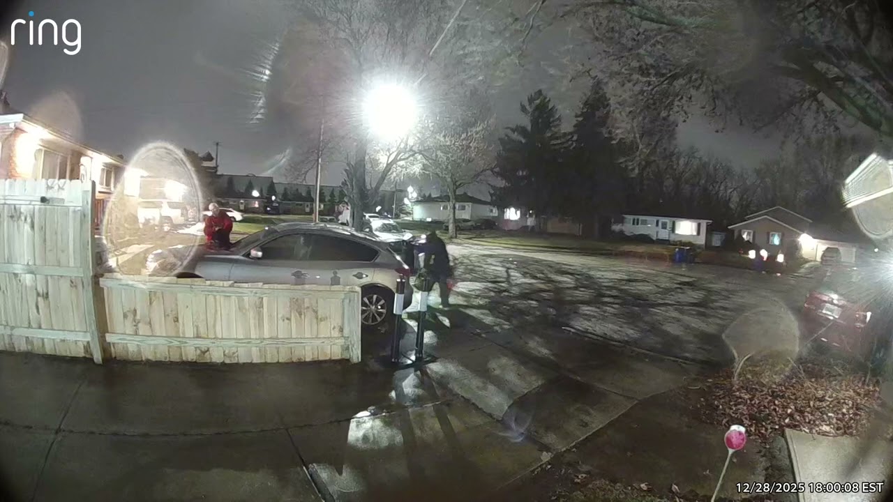 Fred and guys shining light toward Philip & Alicia s house/ has bucket and apparatus 