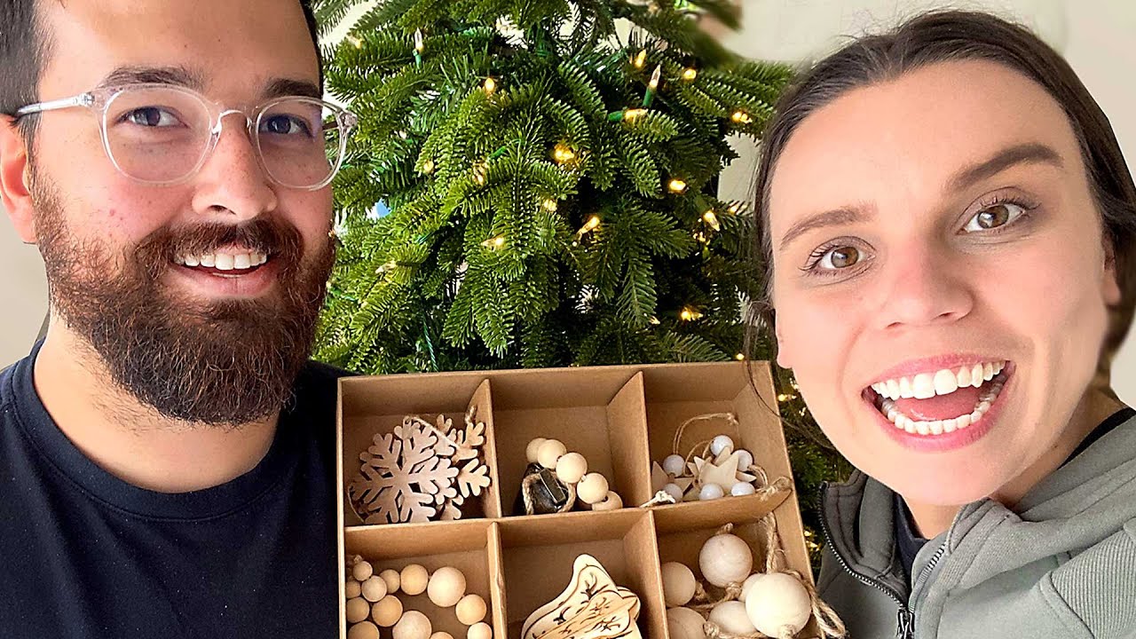 Decorating our first Christmas tree (that James likes)