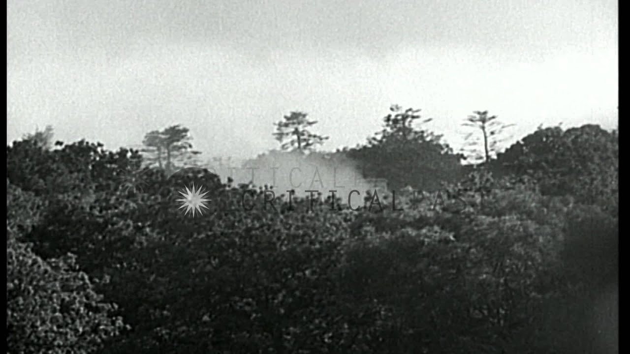 M4-Sherman tanks give cover to advancing infantrymen of US 90th Infantry Division...HD Stock Footage
