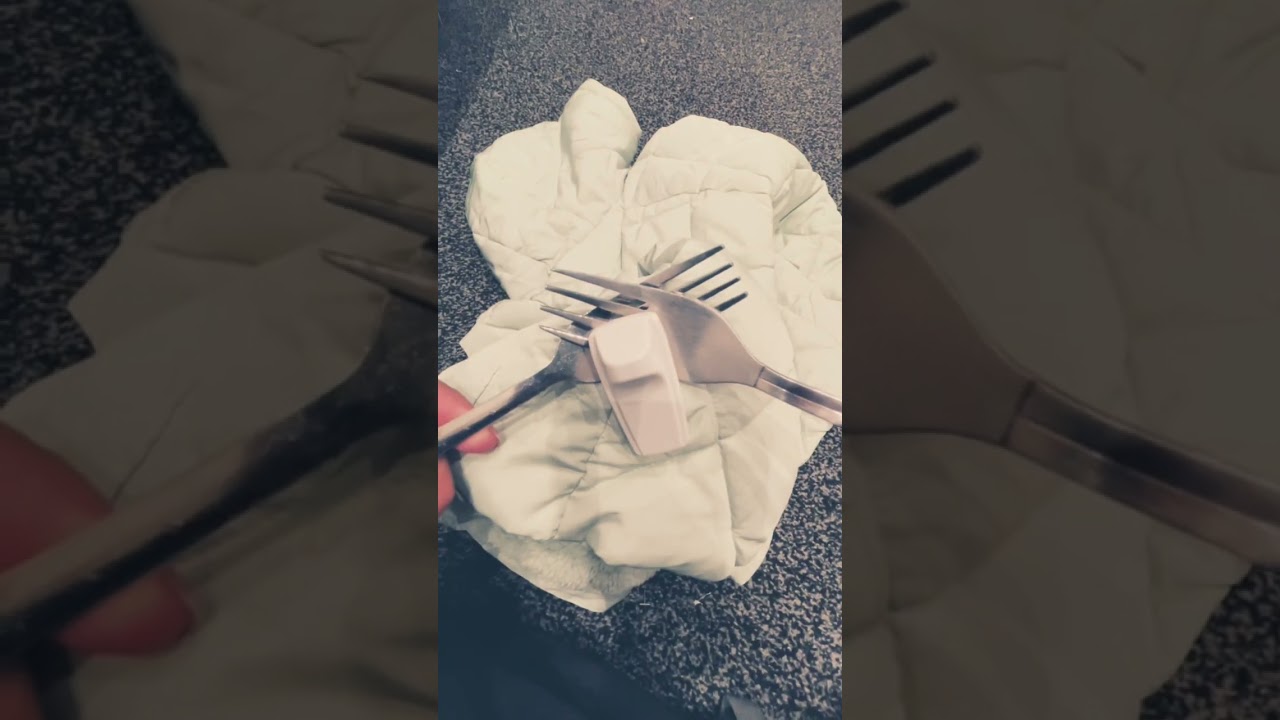 How to: Remove a security tag from clothing with two forks