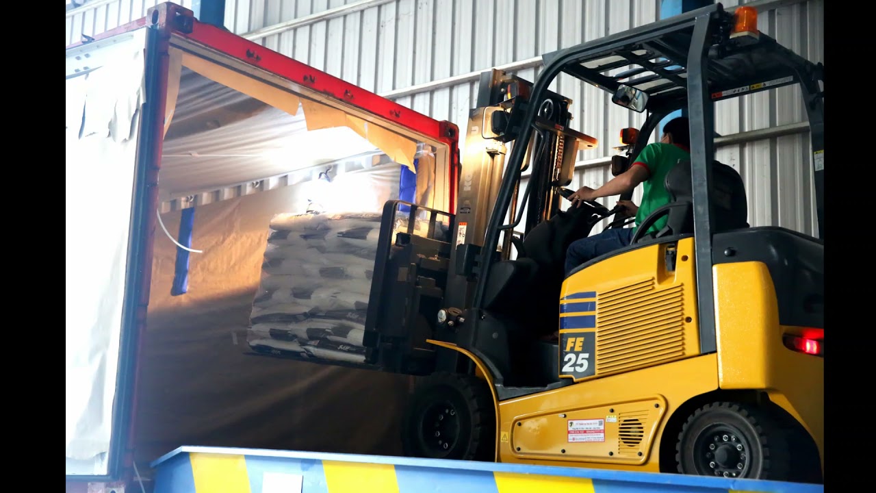 Container loading by SLIP SHEET - Lotus Rice
