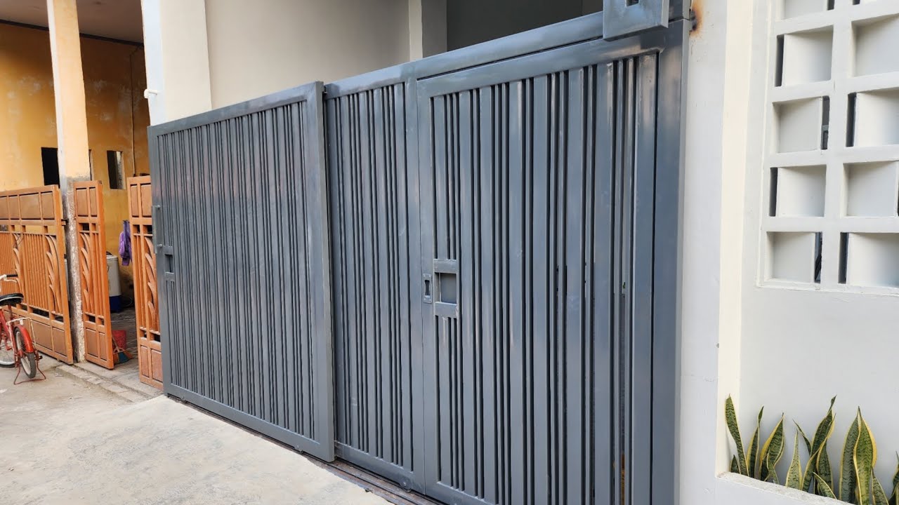 bikin pintu pagar double sliding dan pintu beranak pesanan bu lina di gunung putri