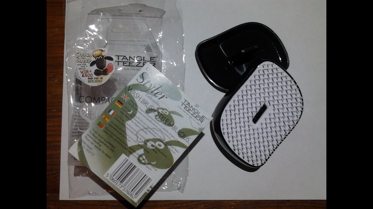 Расческа Tangle Teezer с барашком Шоном с AliExpress (5.1$)