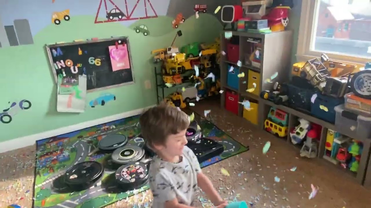 Roomba&rsquo;s and Confetti on the playroom rug