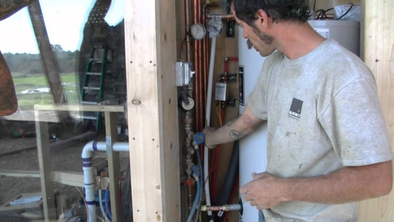 Hot water systems inside an Earthship!