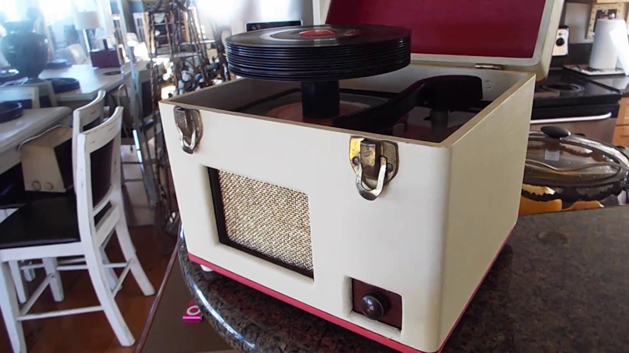 Symphonic 45 automatic record player with companion carrying case.