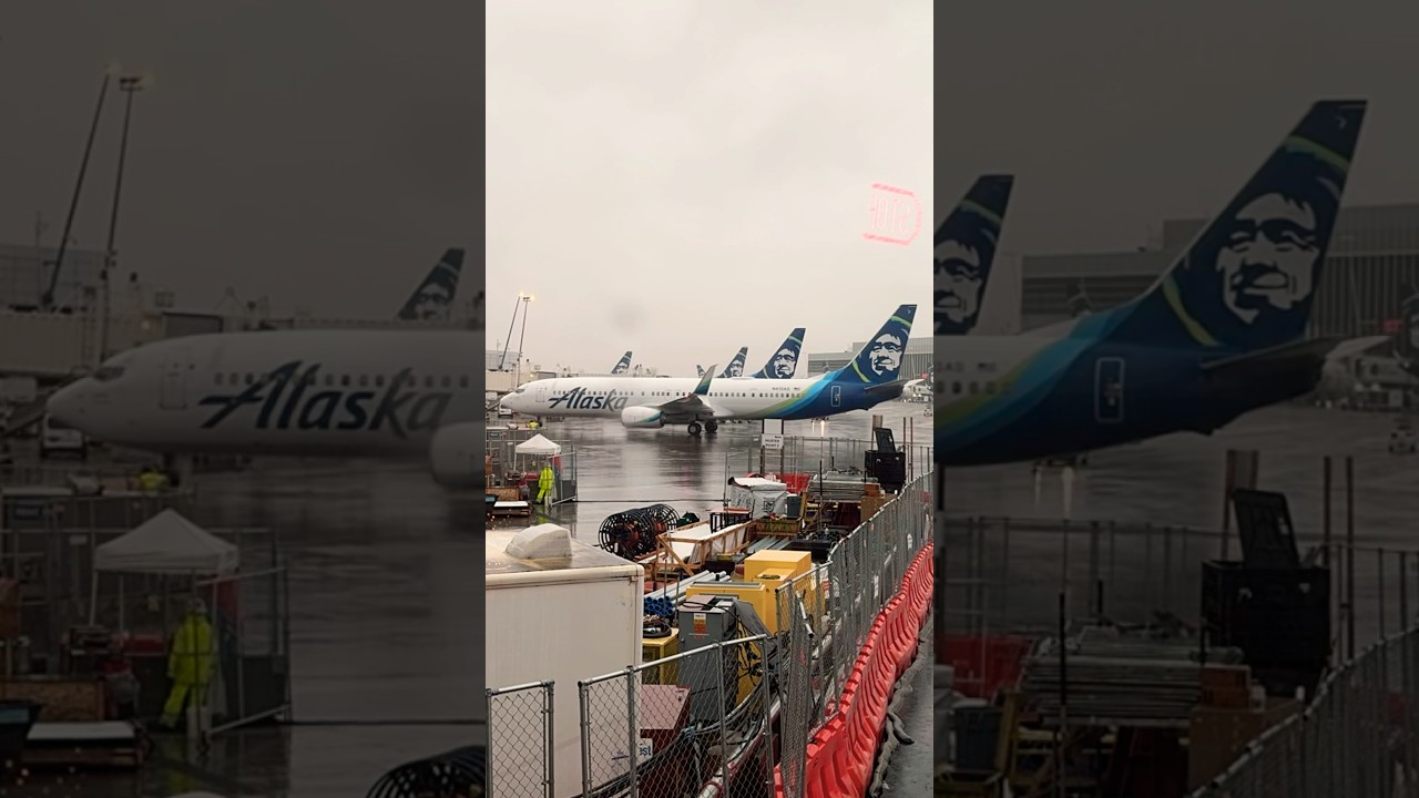Alaska Plane comes in on a wet Seattle day