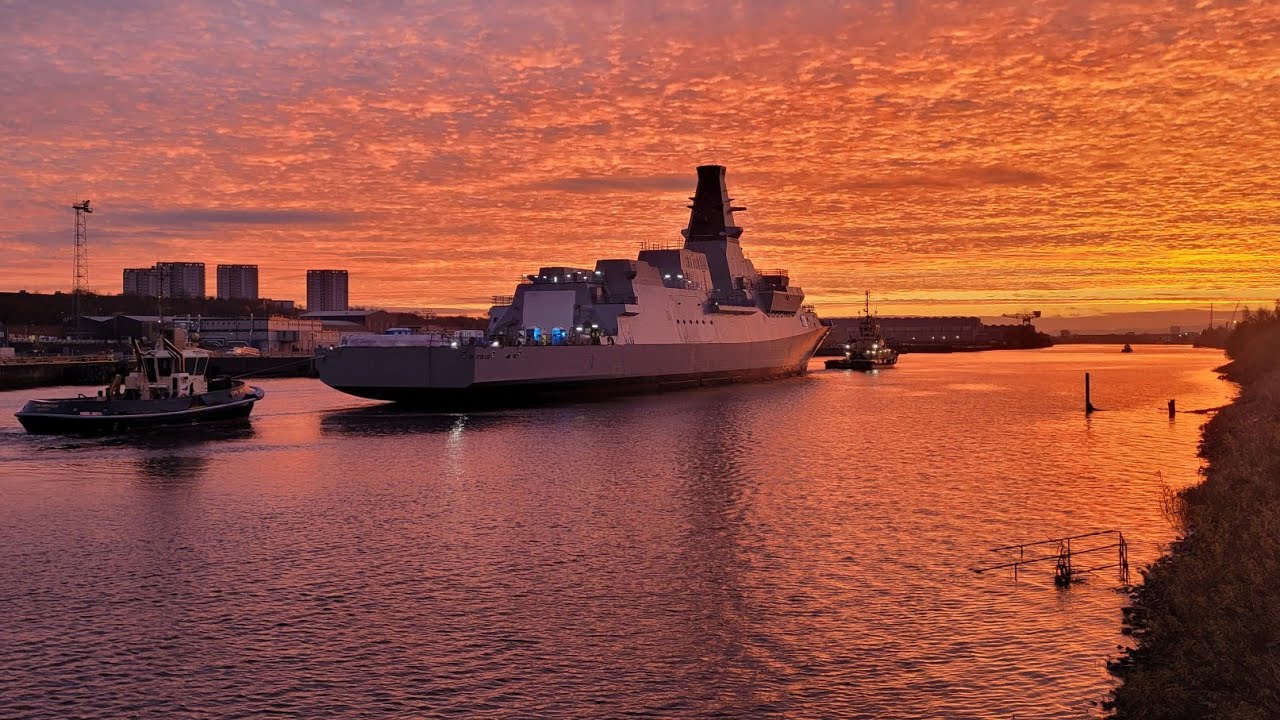 HMS Glasgow, towing the hull to BAE Systems Scotstoun after launch