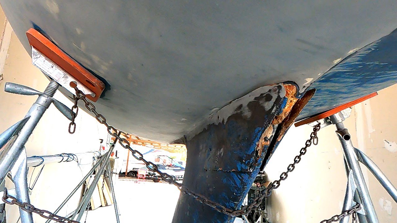 Sailboat Refit #18:  fiberglassing and fairing the keel to hull joint. before bottom paint.