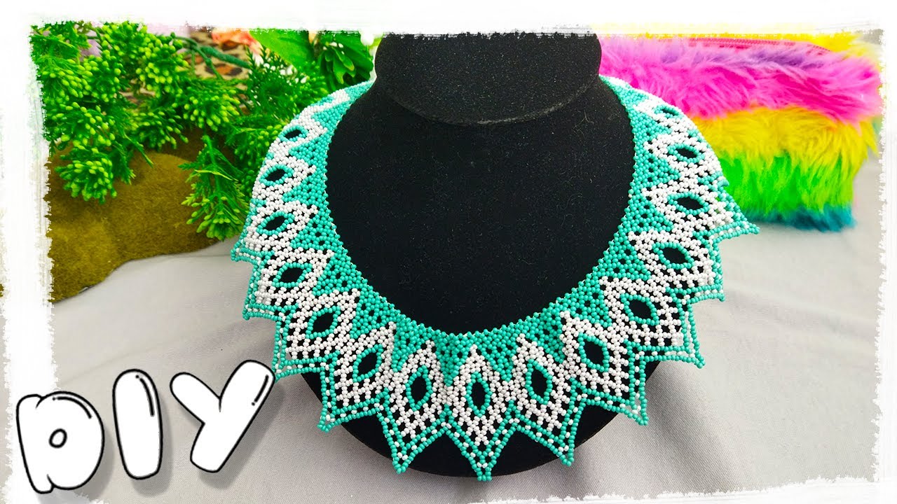 DIY Necklace made of beads in gray and green colors. Beadwork