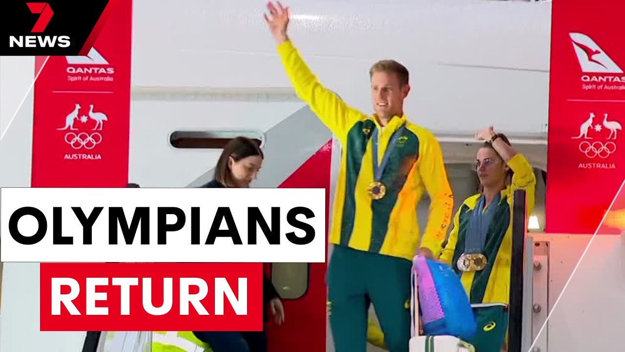 Australian athletes return home from Paris | 7NEWS