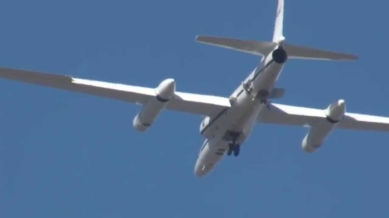 NASA ER-2 Fly by & unrestricted climb punching a hole in the clouds