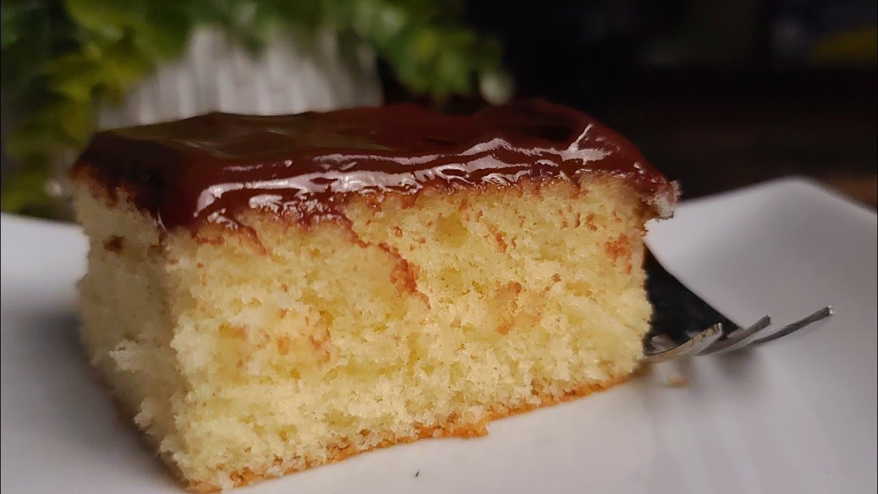 EASY moist simple small sheet cake is made in one bowl. It stays moist for days!