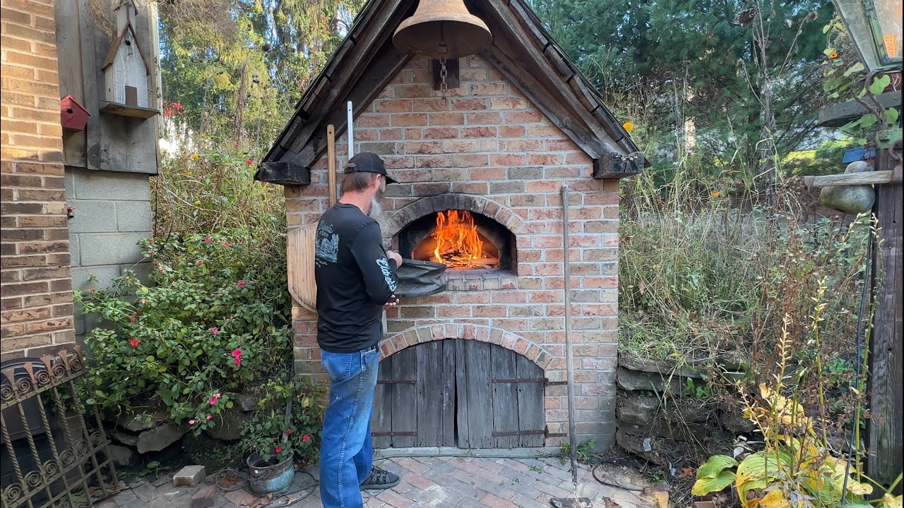 Firing the wood fired brick oven