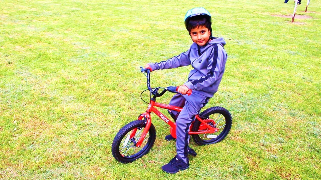 5-YEAR-OLD LEARNS HOW TO RIDE A BIKE