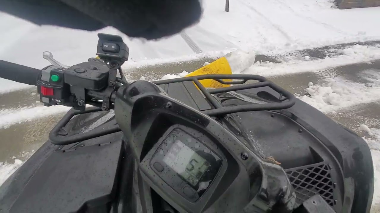 Brute Force 750 Eps plowing Heavy ice and slush