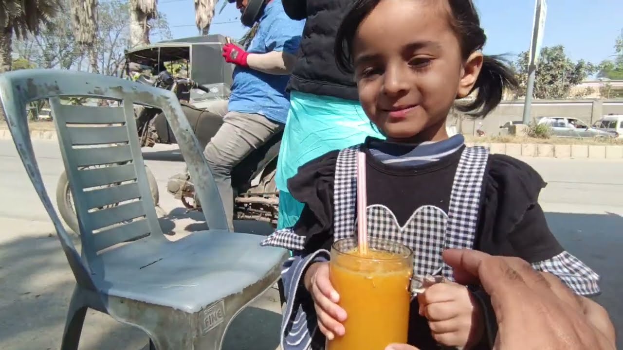Enjoying Fresh Orange Juice
