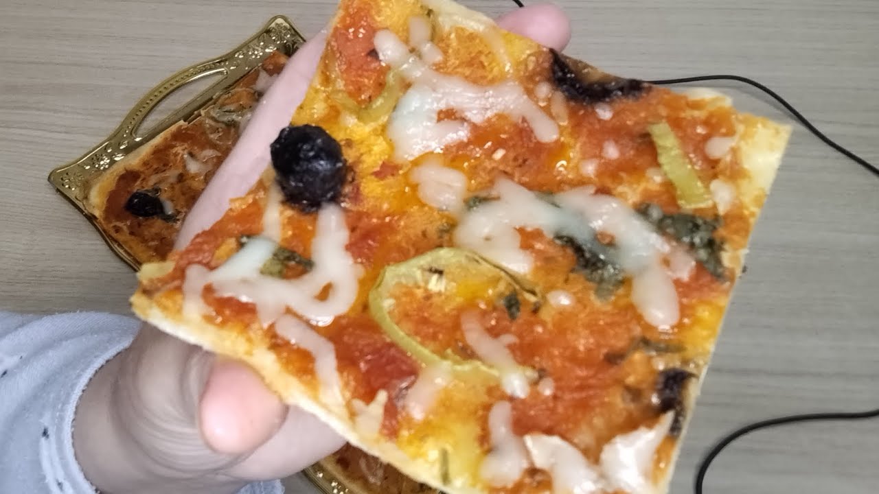 Pizza carrée بيتزا  كاري