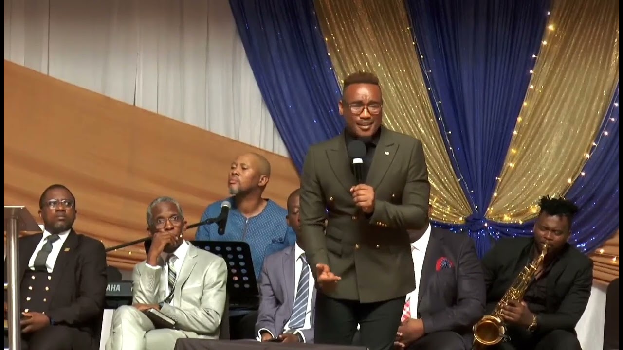 Mvuzo Danster singing "it's my desire" at the SDASA end year function in Gqeberha