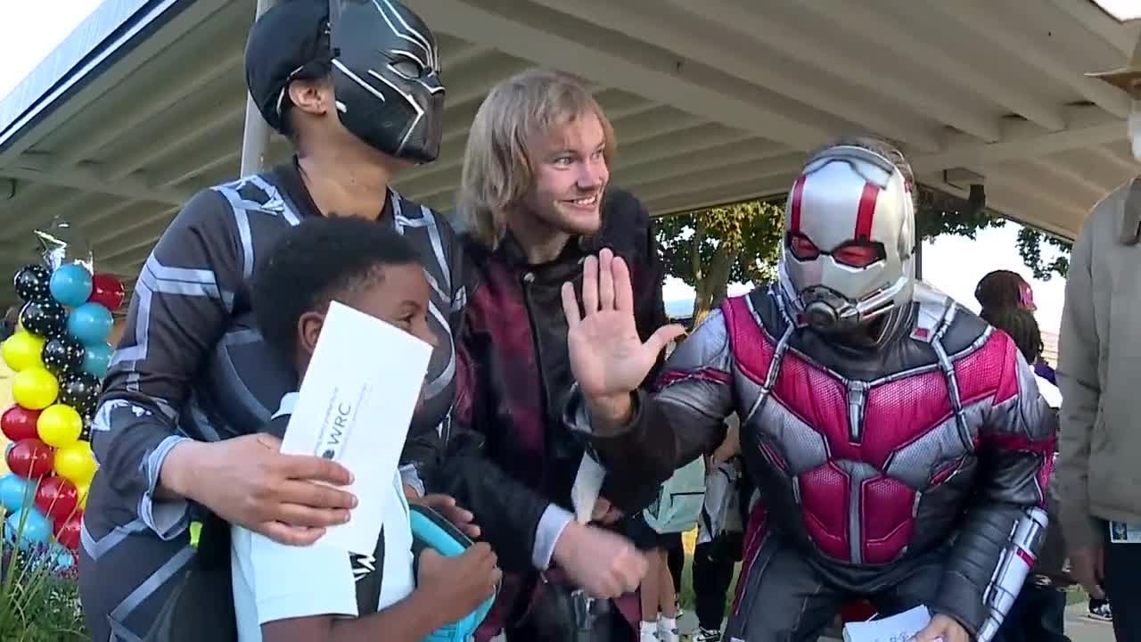 Superheroes welcome incoming students for First Day of School in Pontiac