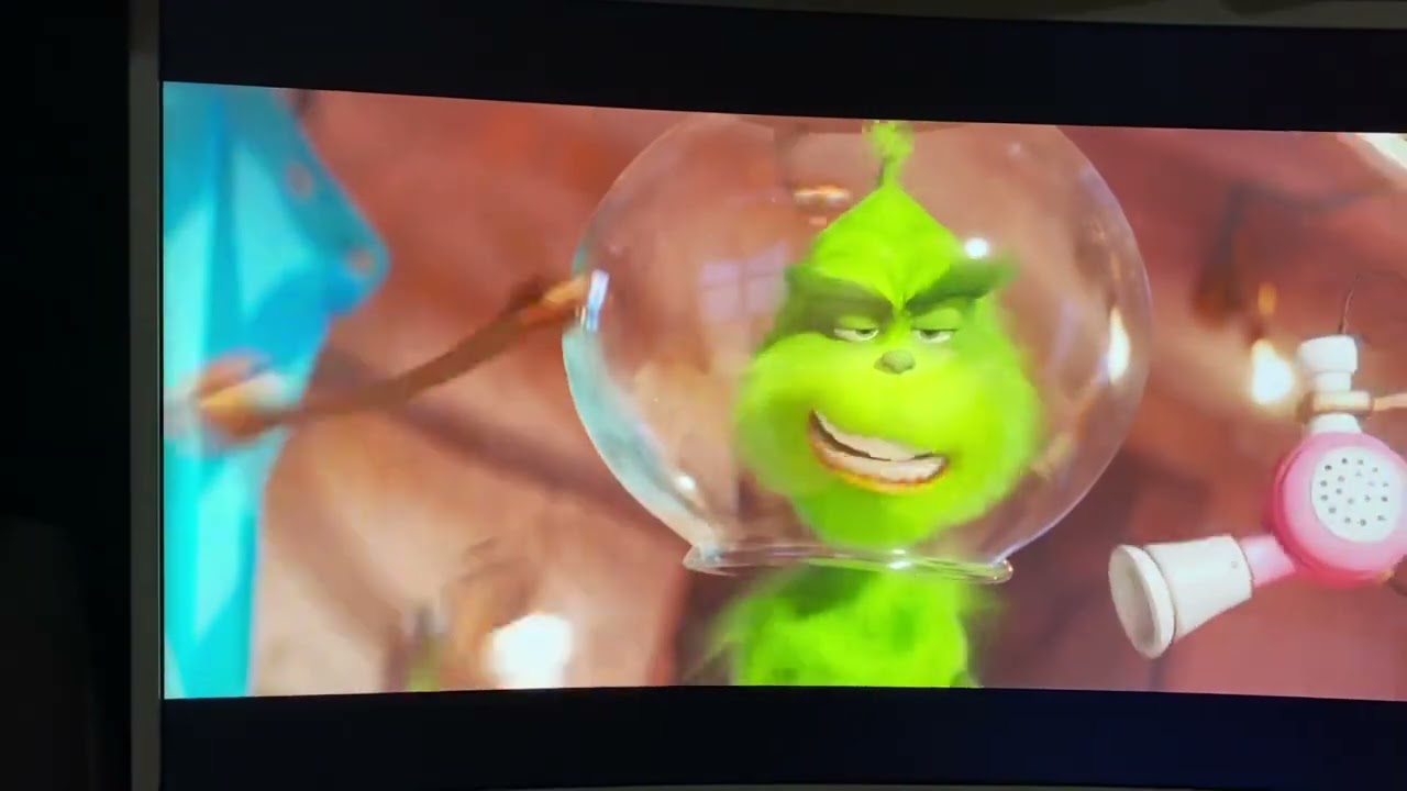 The Grinch drinks coffee and takes a shower