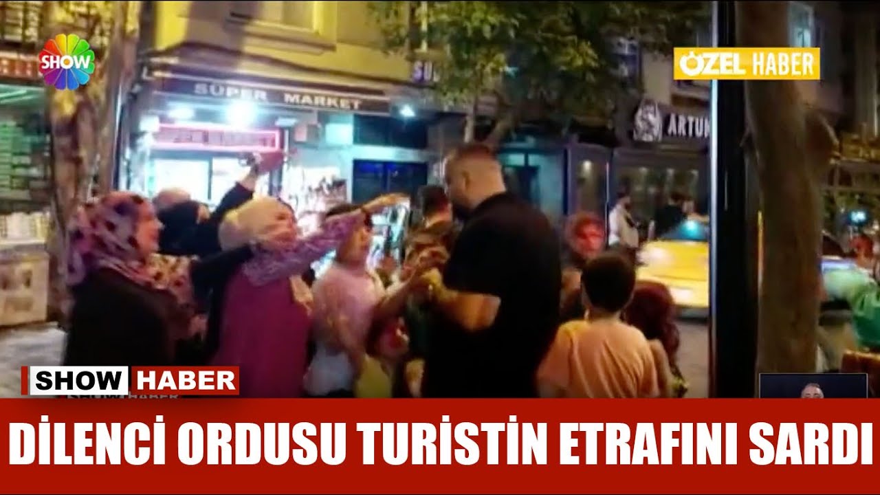 Dilenci ordusu turistin etrafını sardı