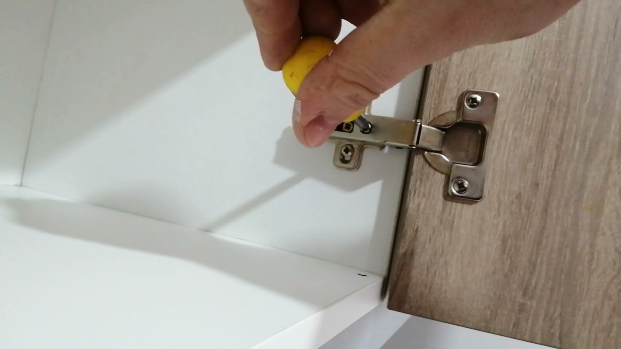 Como ajustar puertas de cocina