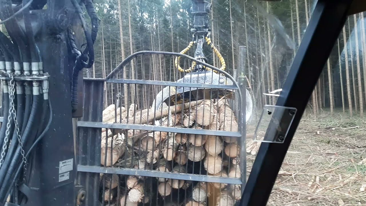 Forwarder Ponsse Wisent , wood dump , Wood export operator.