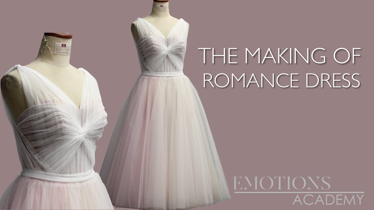 THE MAKING OF ROMANCE  V-NECKLINE  DRAPING  WITH  TULLE  ILLUSION  BODICE .