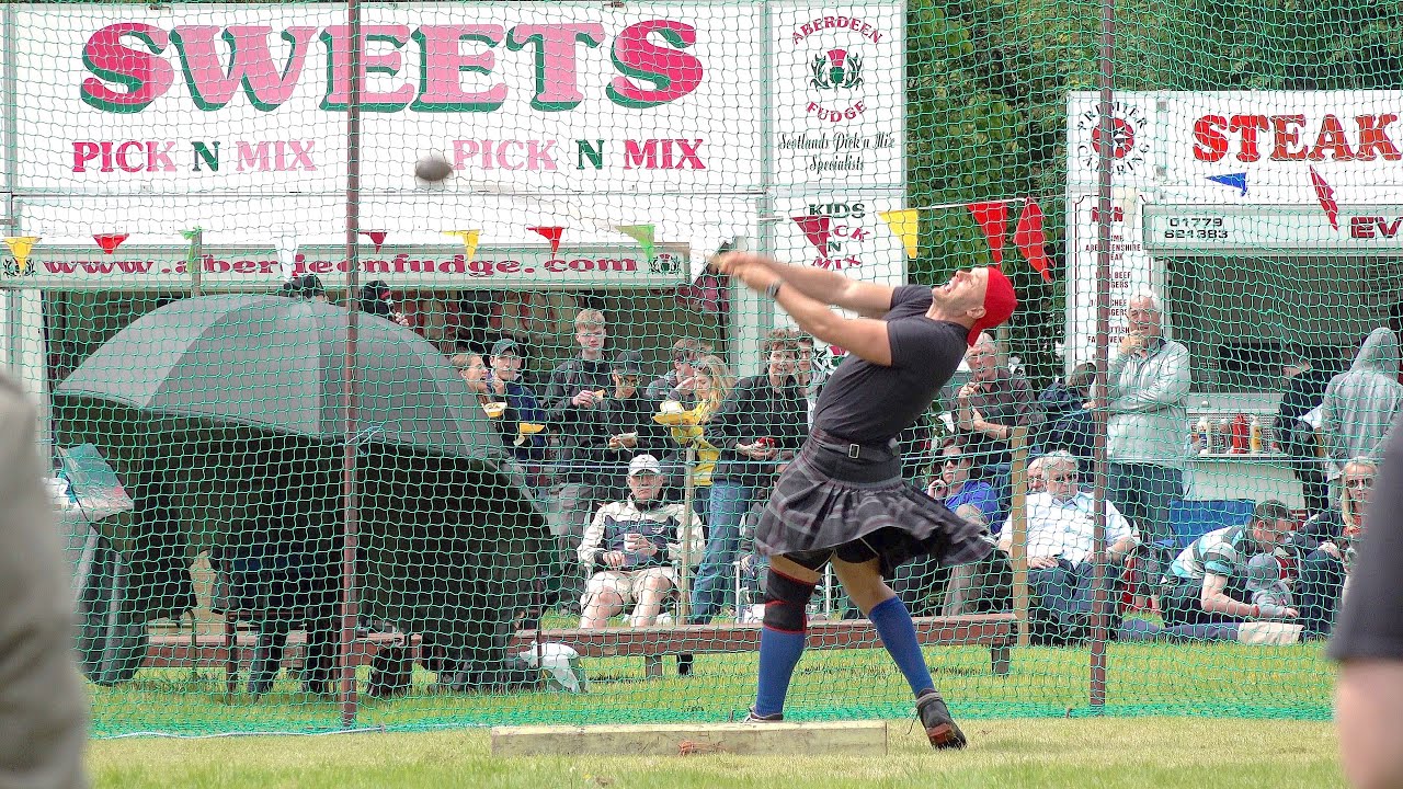 Scottish Heavy events, Hammer, Shot Put, Tug o' War and Caber Toss during Drumtochty Highland Games