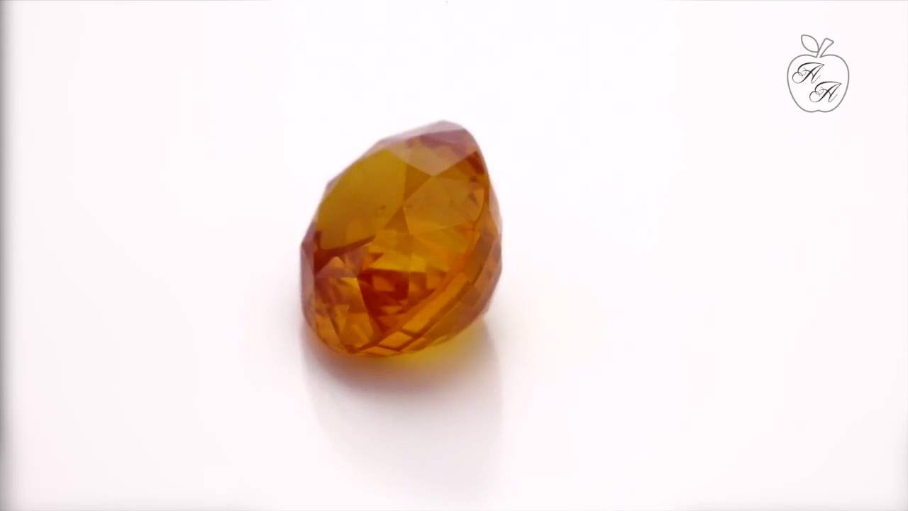 A loose natural orange sapphire gemstone