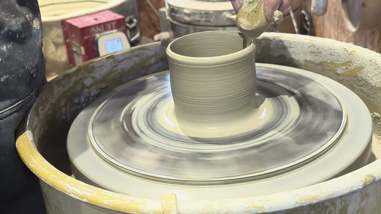 Throwing a  mug one handed - Pottery in my garden studio