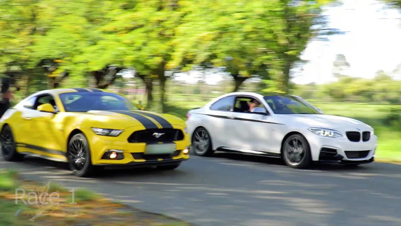 BMW M235i vs 2017 Ford Mustang GT, drag race