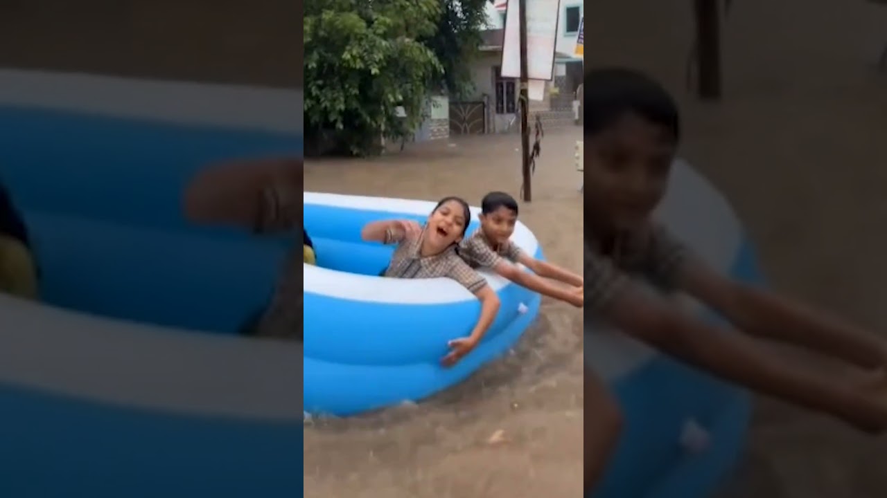 Ahmedabad sinks, but the fun goes on: Residents enjoy rain dance under a bridge