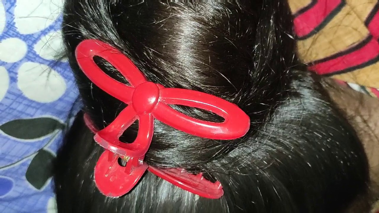After hair wash big knot bun and open silky hair.