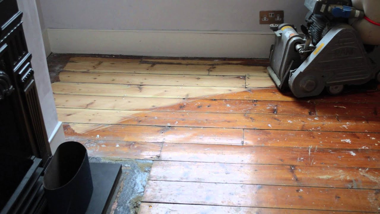 Floor sanding with Frank belt sander, 24 grit belt