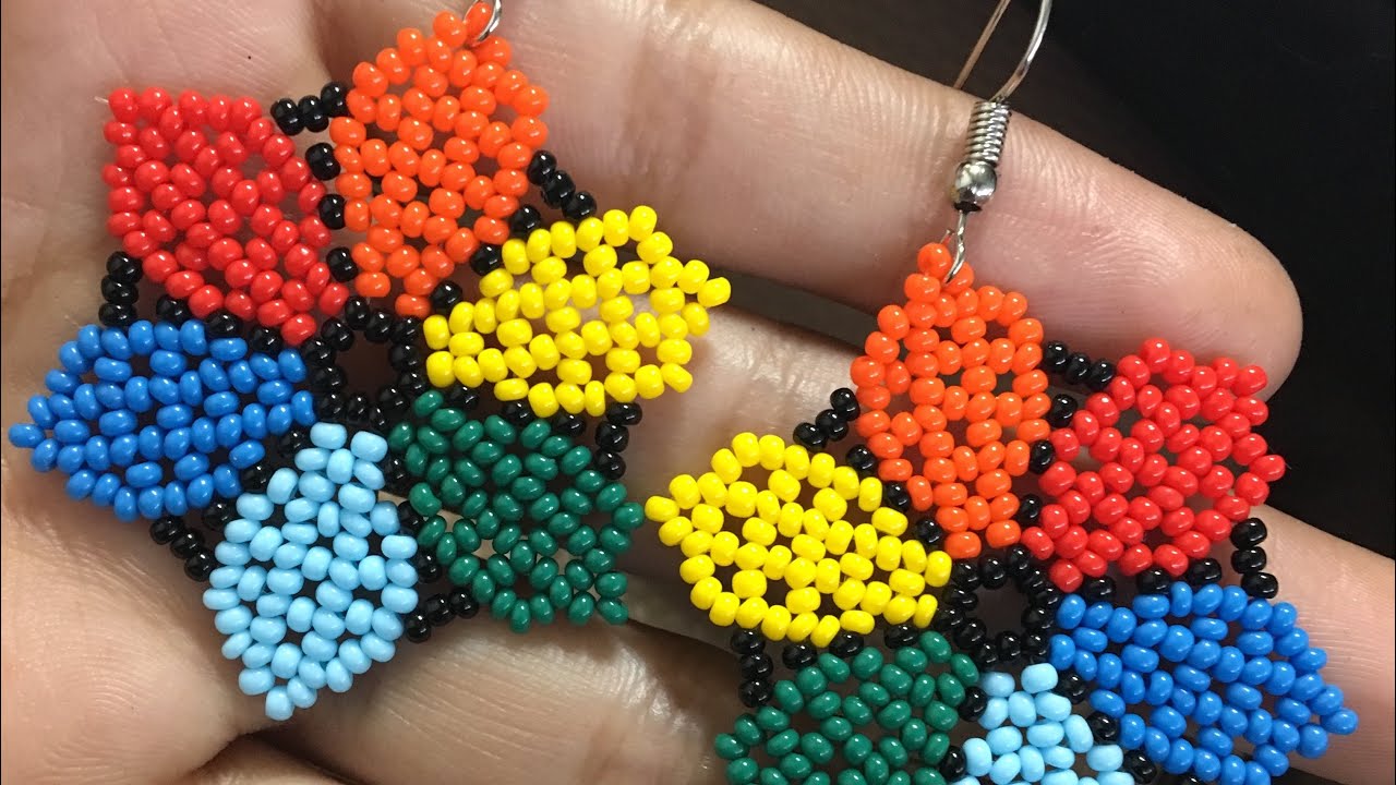 ARETES EN MOSTACILLA FLOR