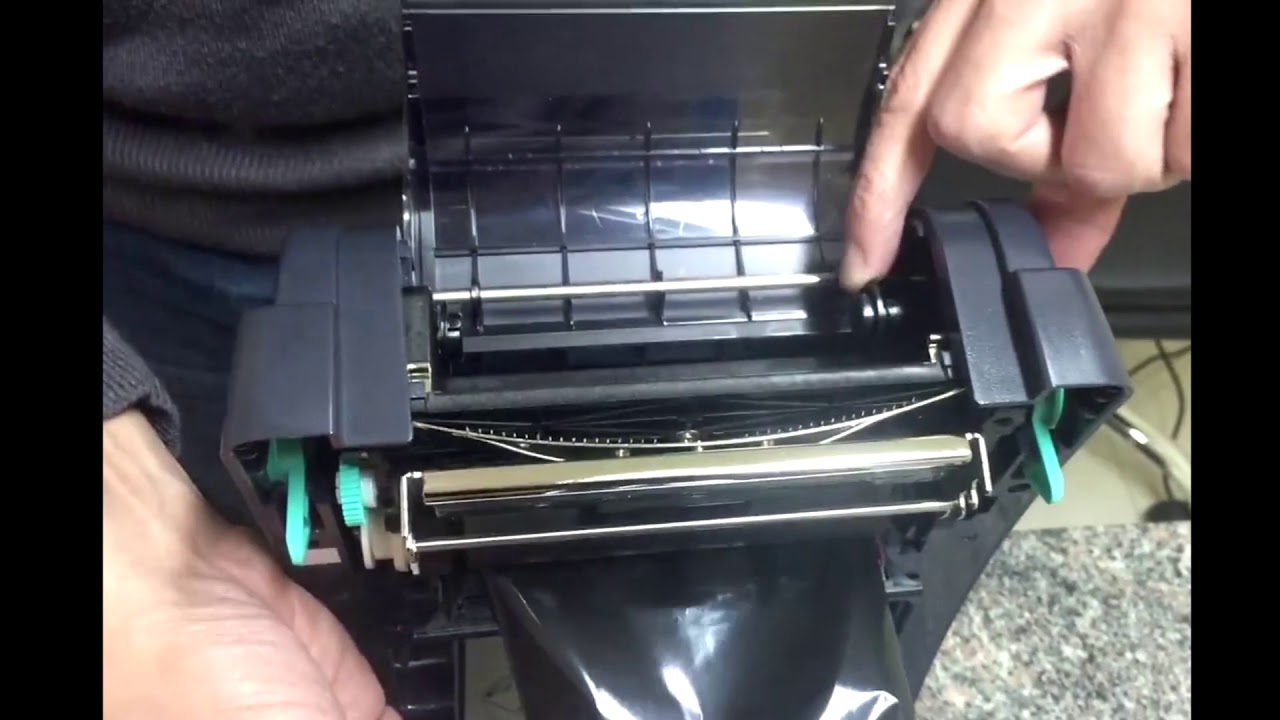 TSC TTP 244 CE - ¿Cómo calibrar y colocar etiquetas? ¿Cómo colocar ribbon?