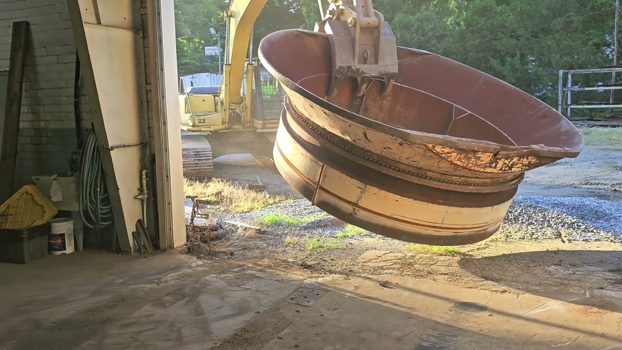 Robbie flipping a Diamond Z tub so I can weld the other side.