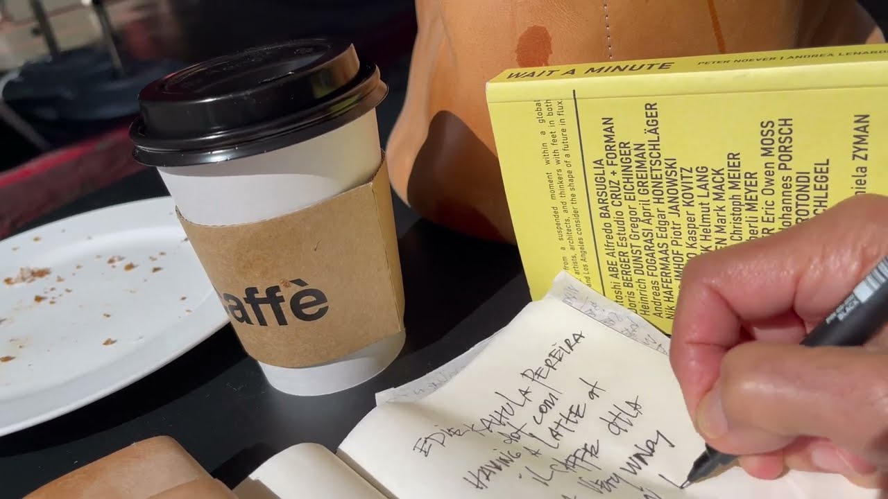 Edie Kahula Pereira at Il Caffe DTLA writing a note when a surprise visitor...